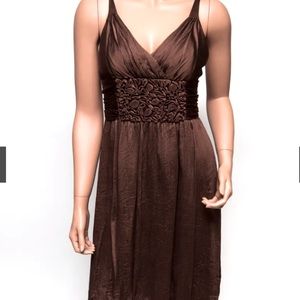 BCBGMAXAZRIA Chocolate brown silk dress size small. V neck silk roses detailing